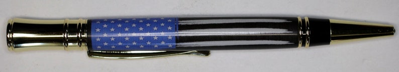 Completed Thin Blue Line Officer pen shown for reference; kneeling knight display prop is not included.